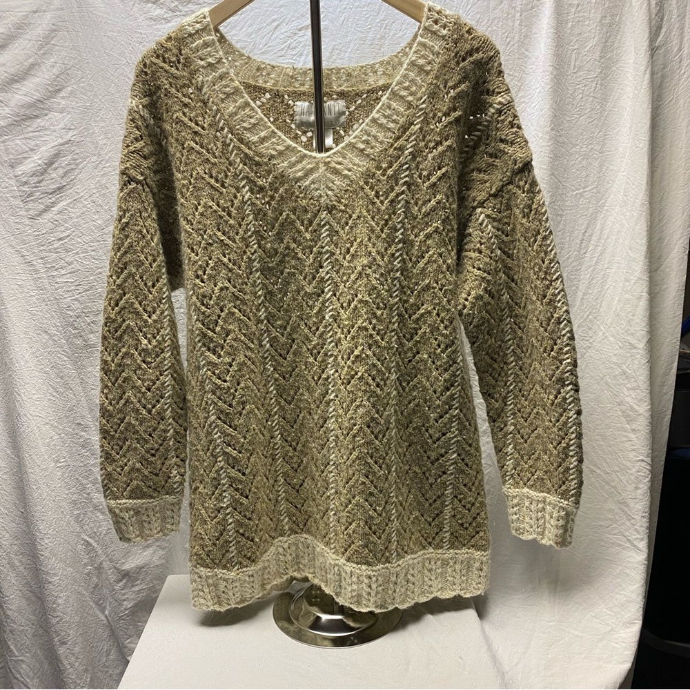 The limited hand knit, wool blend cable boho chic, camel mid thigh sweater. P/S